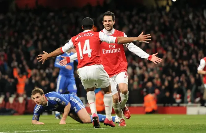 Framed Print : Glory Days: Fabregas and Walcott's Unforgettable Celebration after Arsenal's 3:1 Victory over Chelsea