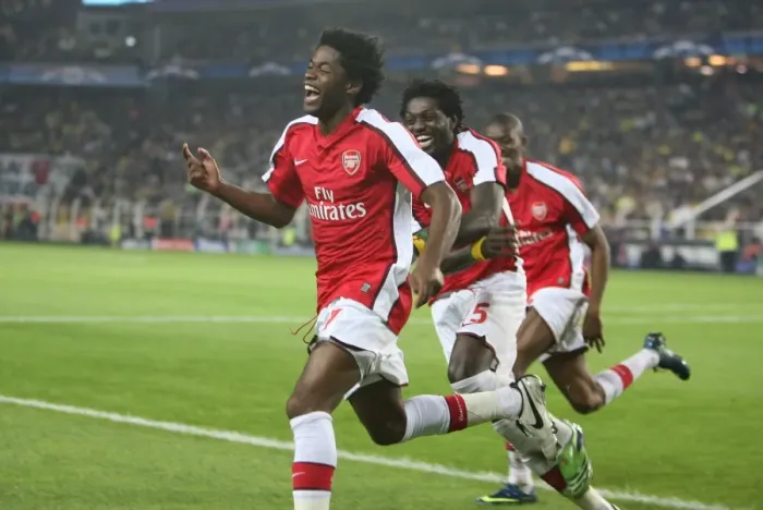 Framed Print : Four Goal Blitz: Song, Adebayor, and Diaby Celebrate Arsenal's Dominant 5-2 Win Over Fenerbahce in the UEFA Champions League