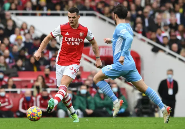 Framed Print : Granit Xhaka: In Action for Arsenal Against Manchester City, Premier League 2021-22 Framed Print : Granit Xhaka: In Action for Arsenal Against Manchester City, Premier League 2021-22