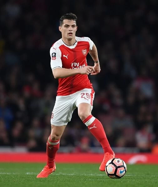 Granit Xhaka in Action: Arsenal vs. Lincoln City, Emirates FA Cup Quarter-Final