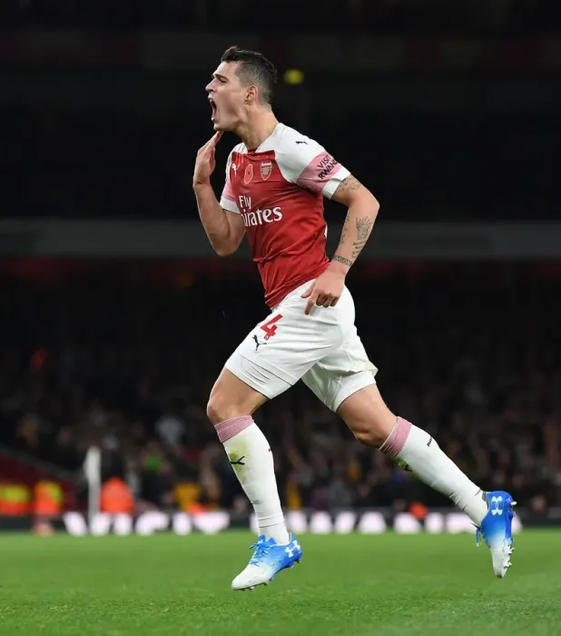 Framed Print : Granit Xhaka in Action: Arsenal vs. Wolverhampton Wanderers, Premier League 2018-19