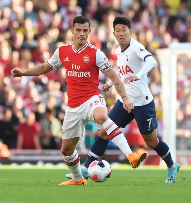 Framed Print : Granit Xhaka in Action: Arsenal vs. Tottenham, Premier League 2019-20 Framed Print : Granit Xhaka in Action: Arsenal vs. Tottenham, Premier League 2019-20