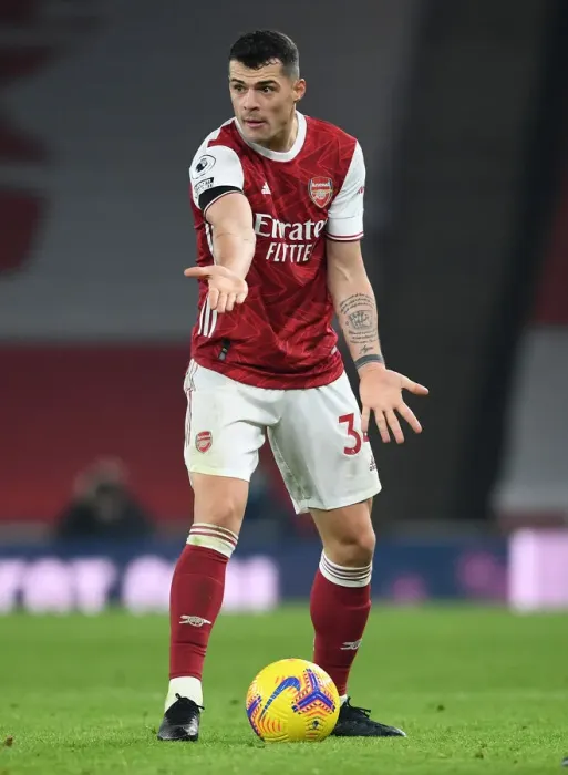 Framed Print : Granit Xhaka in Action: Arsenal vs. Wolverhampton Wanderers (Premier League 2020-21, Emirates Stadium) - Behind Closed Doors
