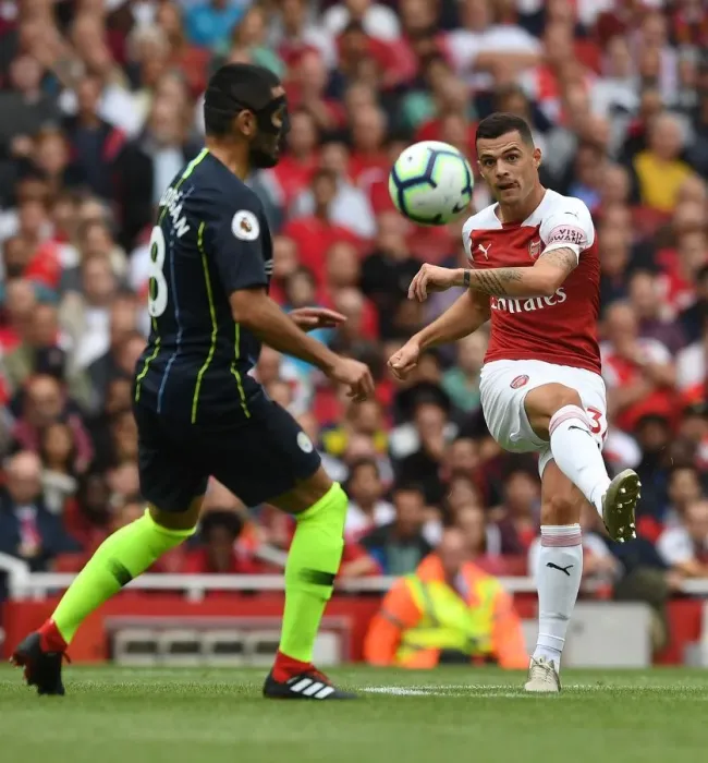 Framed Print : Granit Xhaka in Action: Arsenal vs Manchester City, Premier League 2018-19 Framed Print : Granit Xhaka in Action: Arsenal vs Manchester City, Premier League 2018-19