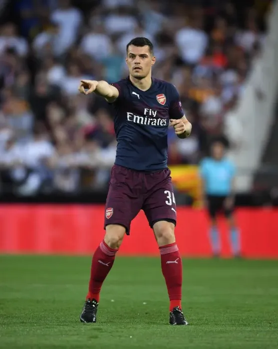 Framed Print : Granit Xhaka in Action: Arsenal vs Valencia, UEFA Europa League Semi-Final (2018-19)