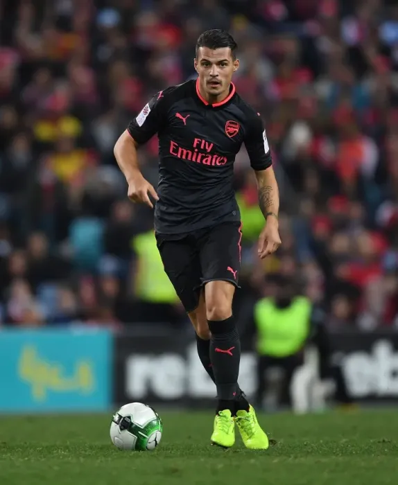 Framed Print : Granit Xhaka in Action: Arsenal's Pre-Season Clash with Sydney FC (2017) Framed Print : Granit Xhaka in Action: Arsenal's Pre-Season Clash with Sydney FC (2017)