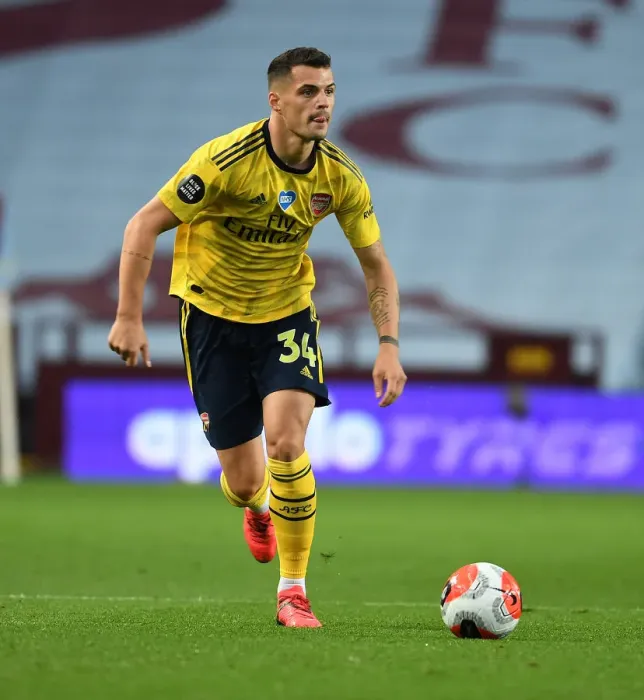 Framed Print : Granit Xhaka in Action: Aston Villa vs. Arsenal, Premier League 2019-2020