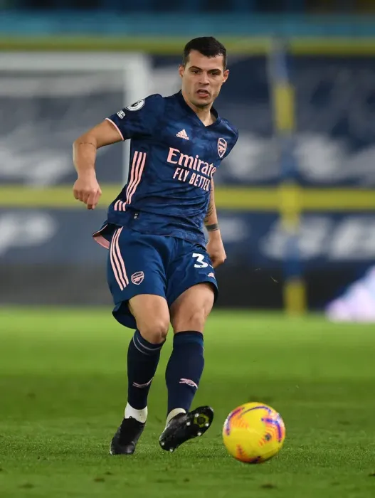 Framed Print : Granit Xhaka in Action: Leeds United vs. Arsenal, Premier League 2020-21 Framed Print : Granit Xhaka in Action: Leeds United vs. Arsenal, Premier League 2020-21