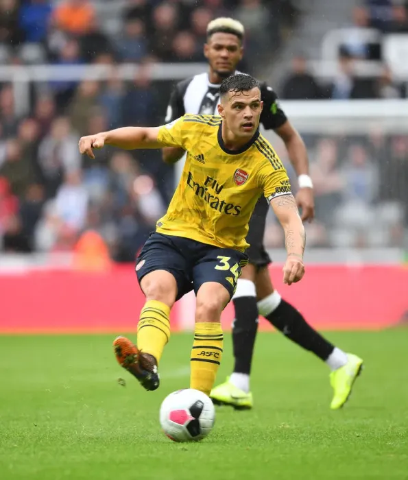Framed Print : Granit Xhaka in Action: Premier League Battle - Arsenal vs. Newcastle United (2019-20) Framed Print : Granit Xhaka in Action: Premier League Battle - Arsenal vs. Newcastle United (2019-20)