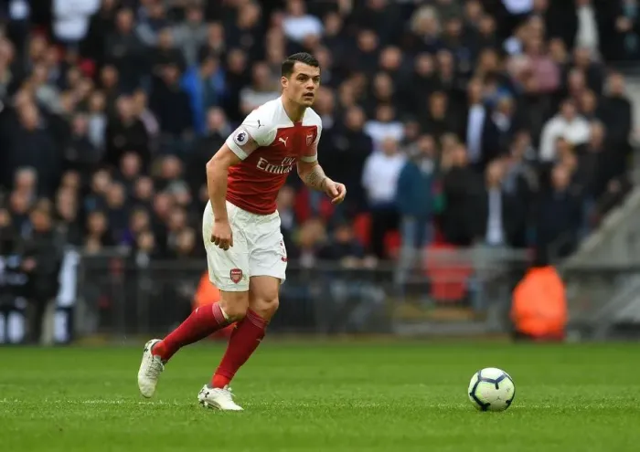 Framed Print : Granit Xhaka: In Action Against Tottenham in the 2018-19 Premier League Clash Framed Print : Granit Xhaka: In Action Against Tottenham in the 2018-19 Premier League Clash