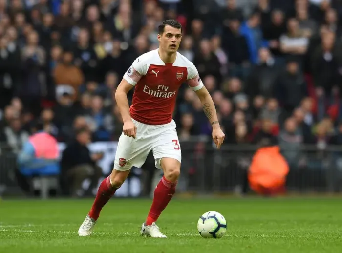 Framed Print : Granit Xhaka in Action: Tottenhotspur vs Arsenal, Premier League 2018-19