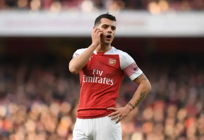 Framed Print : Granit Xhaka: Arsenal Midfielder in Action Against Burnley (Premier League 2018-19) Framed Print : Granit Xhaka: Arsenal Midfielder in Action Against Burnley (Premier League 2018-19)