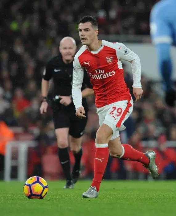 Framed Print : Granit Xhaka: Arsenal Midfielder in Action against Stoke City, Premier League 2016-17