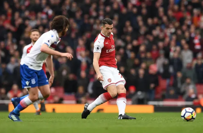 Framed Print : Granit Xhaka: Arsenal Midfielder in Action against Stoke City, Premier League 2017-18 Framed Print : Granit Xhaka: Arsenal Midfielder in Action against Stoke City, Premier League 2017-18