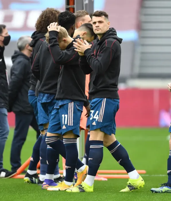 Framed Print : Granit Xhaka: Arsenal Star Prepares for West Ham Clash Amidst Empty London Stadium (Premier League 2020-21)