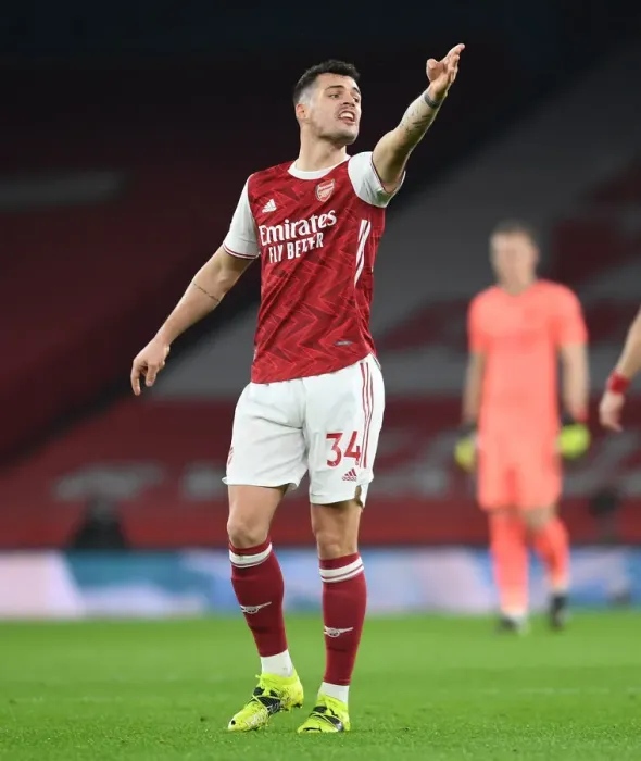 Framed Print : Granit Xhaka: Arsenal Star Shines at Empty Emirates Stadium Against Manchester United, Premier League 2020-21 Framed Print : Granit Xhaka: Arsenal Star Shines at Empty Emirates Stadium Against Manchester United, Premier League 2020-21