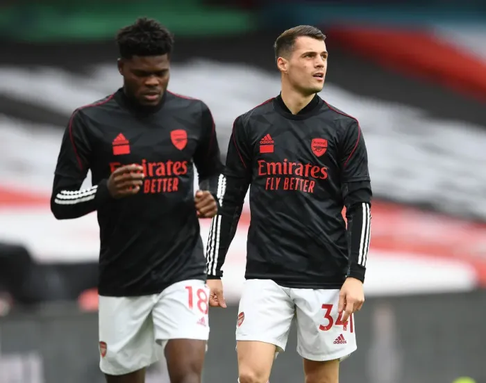 Framed Print : Granit Xhaka: Arsenal's Battle-Ready Midfielder Gears Up for Tottenham Showdown
