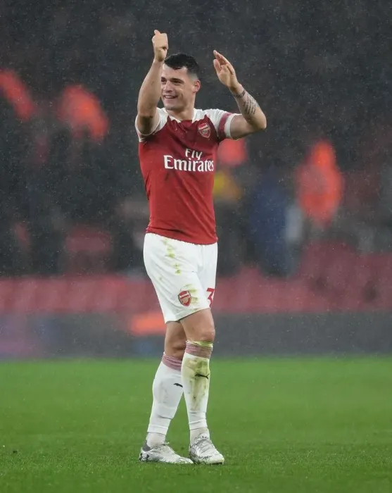 Framed Print : Granit Xhaka: Arsenal's Determined Midfielder Amidst Arsenal FC vs Manchester United Rivalry (2018-19) Framed Print : Granit Xhaka: Arsenal's Determined Midfielder Amidst Arsenal FC vs Manchester United Rivalry (2018-19)