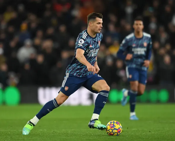 Framed Print : Granit Xhaka: Arsenal's Midfield Battle in Wolverhampton Premier League Clash 2021-22