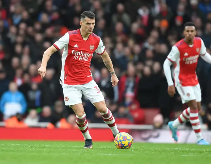Framed Print : Granit Xhaka: Arsenal's Midfield Maestro in Action against Brentford, Premier League 2021-22