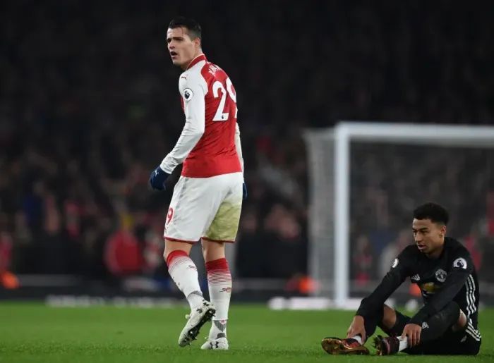 Framed Print : Granit Xhaka: Arsenal's Midfield Maestro in Action Against Manchester United, Premier League 2017-18