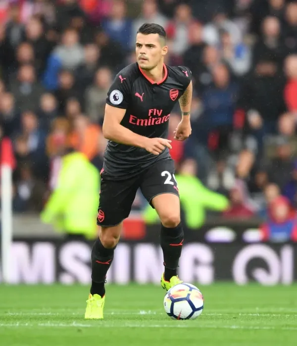 Framed Print : Granit Xhaka: Arsenal's Midfield Maestro in Action Against Stoke City, Premier League 2017-18