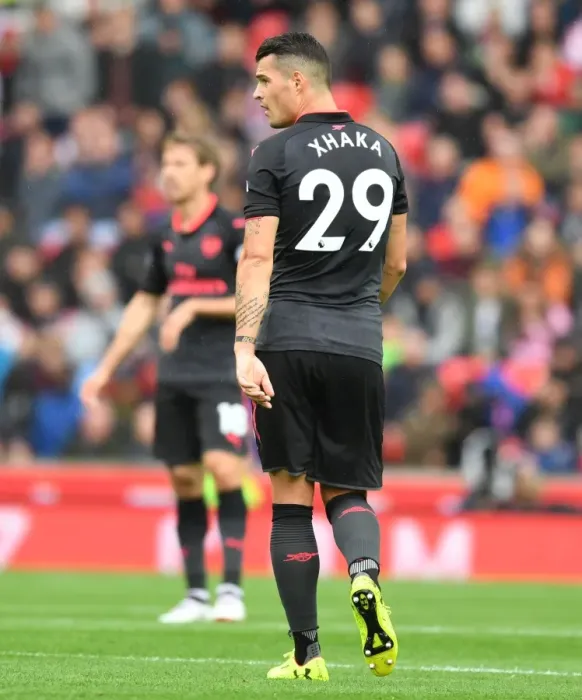 Framed Print : Granit Xhaka: Arsenal's Midfield Maestro in Action Against Stoke City, Premier League 2017-18 Framed Print : Granit Xhaka: Arsenal's Midfield Maestro in Action Against Stoke City, Premier League 2017-18