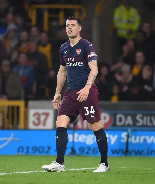 Framed Print : Granit Xhaka: Arsenal's Midfield Maestro in Action vs. Wolverhampton Wanderers Framed Print : Granit Xhaka: Arsenal's Midfield Maestro in Action vs. Wolverhampton Wanderers