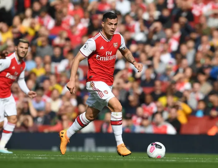 Framed Print : Granit Xhaka: Arsenal's Midfield Maestro in Action vs. AFC Bournemouth, Premier League 2019-20 Framed Print : Granit Xhaka: Arsenal's Midfield Maestro in Action vs. AFC Bournemouth, Premier League 2019-20