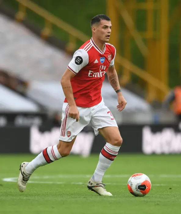 Framed Print : Granit Xhaka: Arsenal's Midfield Maestro in Action vs. Wolverhampton Wanderers Framed Print : Granit Xhaka: Arsenal's Midfield Maestro in Action vs. Wolverhampton Wanderers
