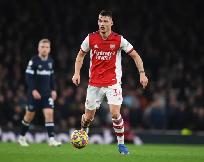 Framed Print : Granit Xhaka: Arsenal's Midfield Maestro in Action Against West Ham United, Premier League 2021-22 Framed Print : Granit Xhaka: Arsenal's Midfield Maestro in Action Against West Ham United, Premier League 2021-22