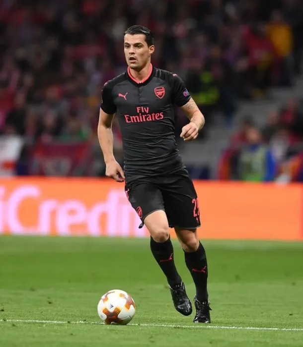 Framed Print : Granit Xhaka: Arsenal's Midfield Maestro in Europa League Battle against Atletico Madrid