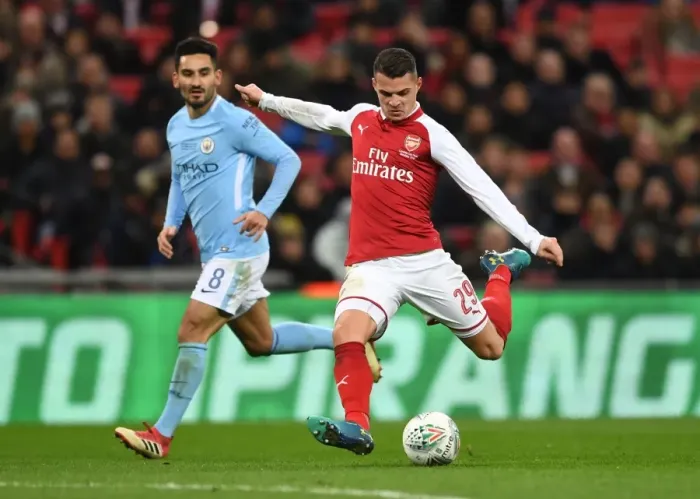 Framed Print : Granit Xhaka: Arsenal's Midfield Maestro Shines in Carabao Cup Showdown Against Manchester City