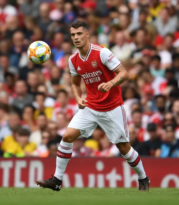Framed Print : Granit Xhaka: Arsenal's Midfield Maestro Shines in Emirates Cup Clash Against Olympique Lyonnais Framed Print : Granit Xhaka: Arsenal's Midfield Maestro Shines in Emirates Cup Clash Against Olympique Lyonnais
