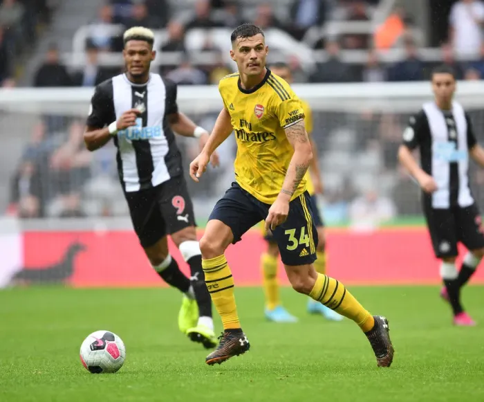 Framed Print : Granit Xhaka: Arsenal's Midfield Maestro Shines in Premier League Battle against Newcastle United Framed Print : Granit Xhaka: Arsenal's Midfield Maestro Shines in Premier League Battle against Newcastle United