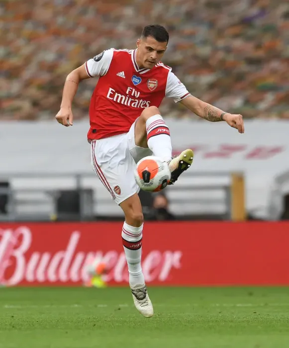 Framed Print : Granit Xhaka: Arsenal's Midfield Maestro Shines Against Wolverhampton Wanderers, Premier League 2019-2020