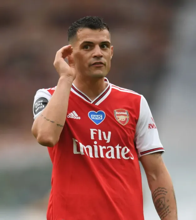 Framed Print : Granit Xhaka: Arsenal's Midfield Maestro Shines Against Wolverhampton Wanderers
