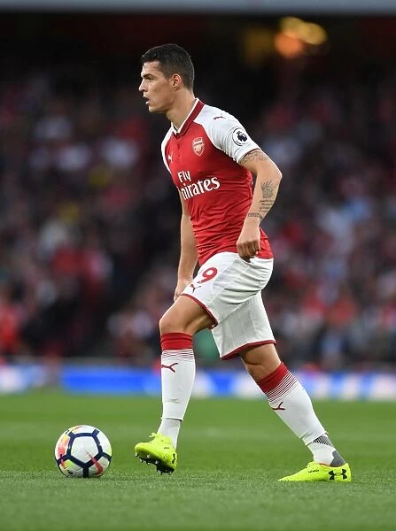 Granit Xhaka: Arsenal's Midfield Mastermind in Action against Leicester City, Premier League 2017-18