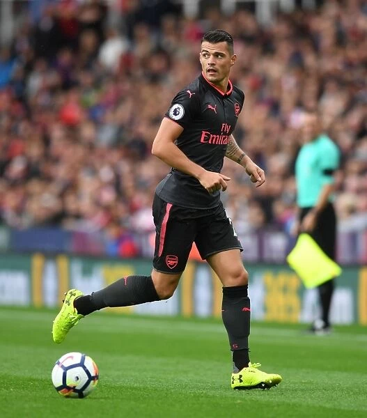 Granit Xhaka: Arsenal's Midfield Mastermind in Action against Stoke City, Premier League 2017-18
