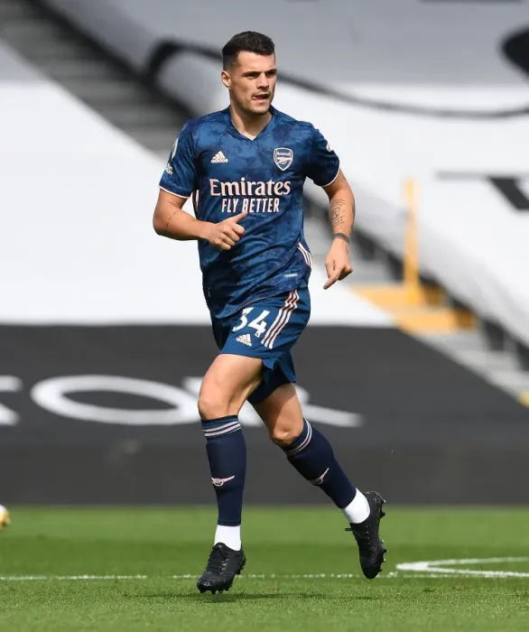 Framed Print : Granit Xhaka: Arsenal's Midfield Mastermind in Action against Fulham, Premier League 2020-21