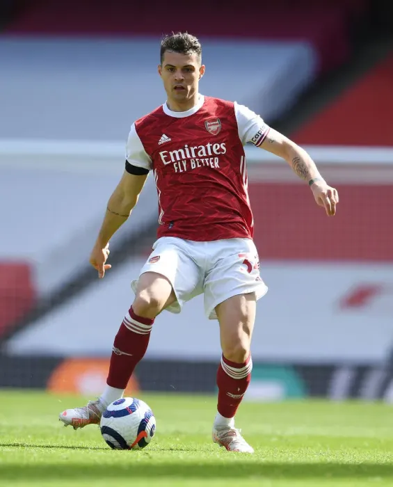 Framed Print : Granit Xhaka: Arsenal's Midfield Mastermind Shines in Empty Emirates Stadium Framed Print : Granit Xhaka: Arsenal's Midfield Mastermind Shines in Empty Emirates Stadium