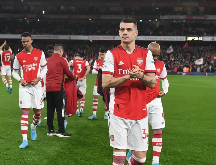Framed Print : Granit Xhaka: Arsenal's Steely Gaze Ahead of Arsenal vs Liverpool Clash (Premier League 2021-22) Framed Print : Granit Xhaka: Arsenal's Steely Gaze Ahead of Arsenal vs Liverpool Clash (Premier League 2021-22)