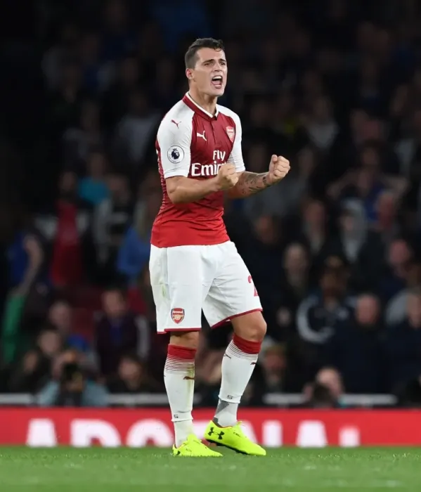 Framed Print : Granit Xhaka: Arsenal's Triumphant Victory Celebration vs. Leicester City (2017-18 Premier League)