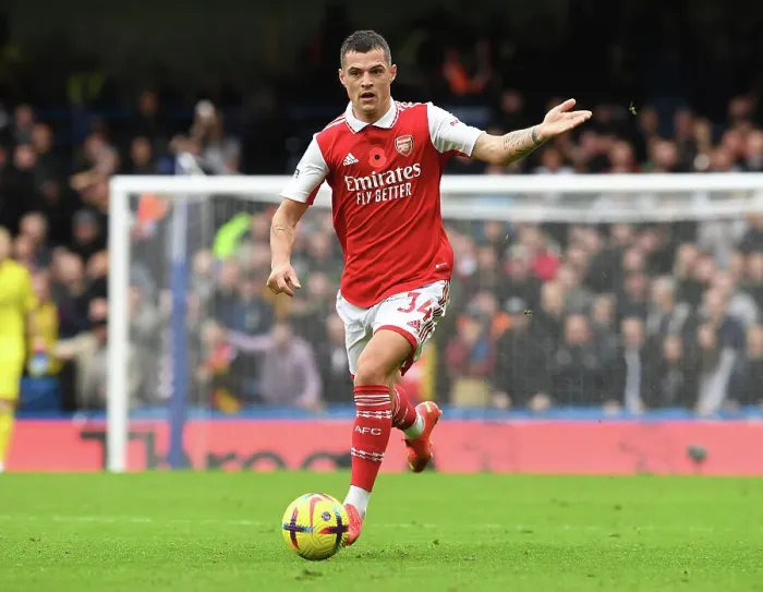 Framed Print : Granit Xhaka: Battle at the Bridge - Chelsea vs. Arsenal 2022-23, Premier League Showdown Framed Print : Granit Xhaka: Battle at the Bridge - Chelsea vs. Arsenal 2022-23, Premier League Showdown