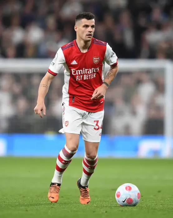 Framed Print : Granit Xhaka: Battle in the Heart of Arsenal's Midfield at Tottenham vs. Arsenal, 2021-22 Premier League Framed Print : Granit Xhaka: Battle in the Heart of Arsenal's Midfield at Tottenham vs. Arsenal, 2021-22 Premier League