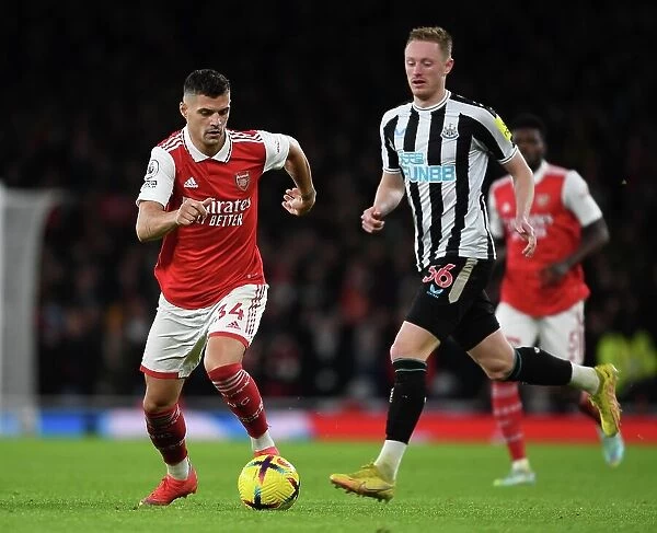 Granit Xhaka Battles Past Sean Longstaff: Arsenal vs Newcastle United, Premier League 2022-23