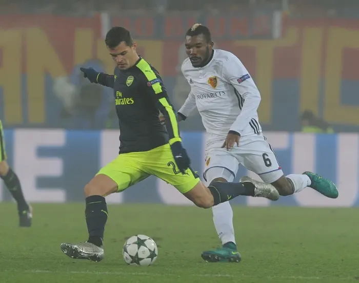 Framed Print : Granit Xhaka Breaks Past Basel's Geoffroy Serey Die: Arsenal vs FC Basel, UEFA Champions League, 2016
