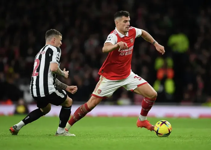 Framed Print : Granit Xhaka Breaks Past Kieran Trippier: Arsenal vs Newcastle United, Premier League 2022-23 Framed Print : Granit Xhaka Breaks Past Kieran Trippier: Arsenal vs Newcastle United, Premier League 2022-23