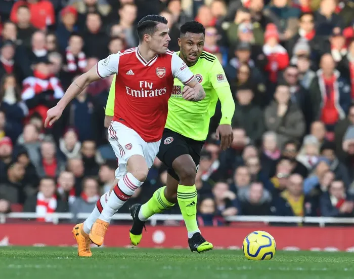 Framed Print : Granit Xhaka Breaks Past Lys Mousset: Arsenal vs Sheffield United, Premier League 2019-20 Framed Print : Granit Xhaka Breaks Past Lys Mousset: Arsenal vs Sheffield United, Premier League 2019-20