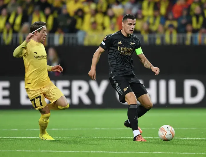 Framed Print : Granit Xhaka Breaks Past Opponent in Arsenal's UEFA Europa League Clash vs. Bodø / Glimt